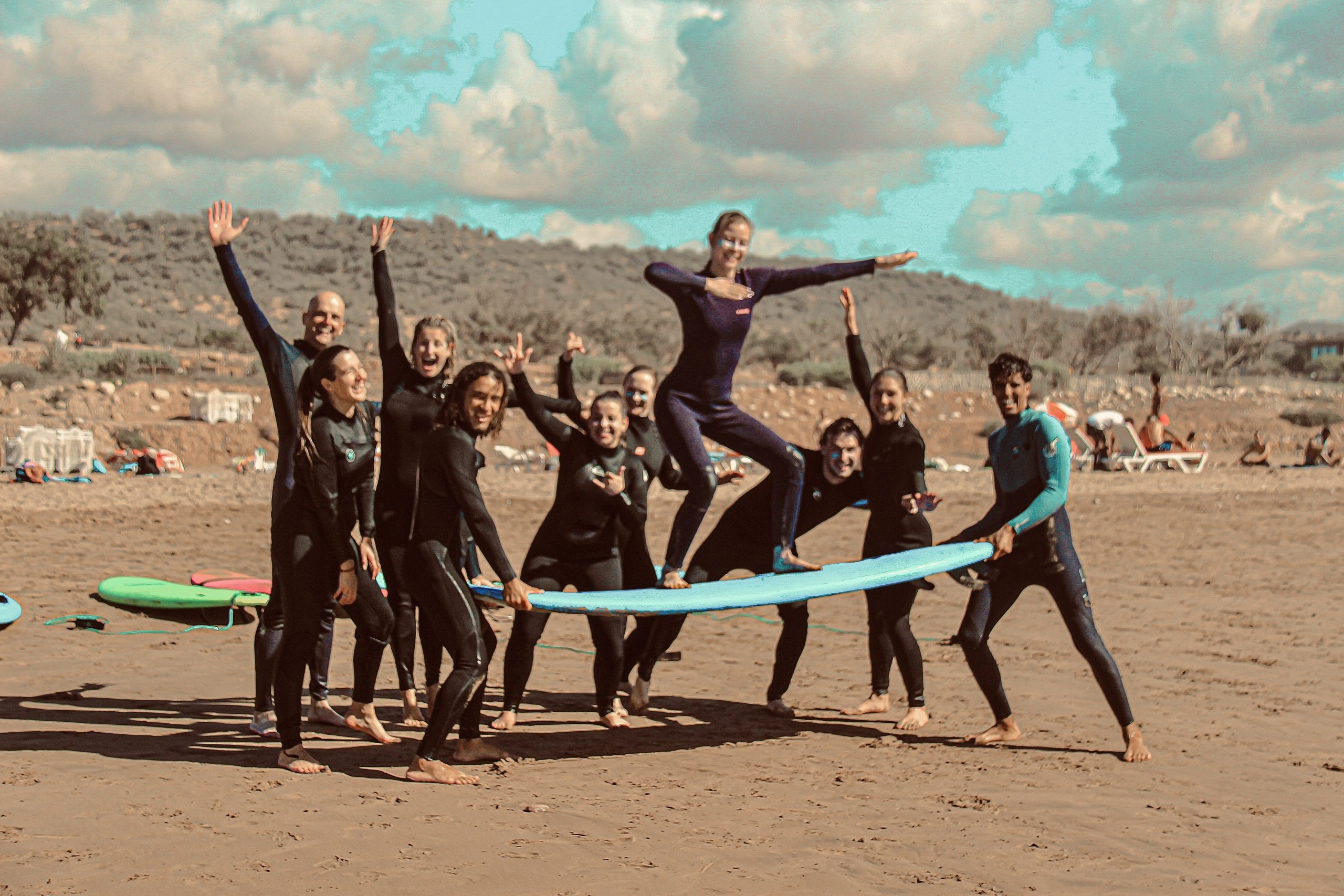 Tafokt guests sharing a surf day together on the beach